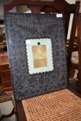 A Victorian frame having carved scriptural, ivy , fern and pokerwork decoration, with monogram BK