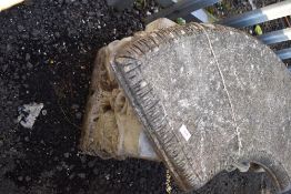 A concrete garden seat