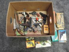 A box containing Toy replica Cap Guns including Flippy Python 357, Lone Star Luger, Captain Cutlass,