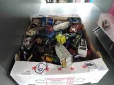 A box of playworn diecasts including Budgie, Dinky, Corgi etc