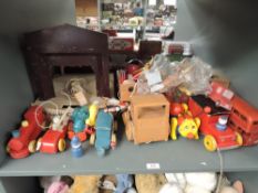 A shelf of vintage wooden and plastic Toys including Pollocks Theatre (af), Pull Along, Puzzles etc
