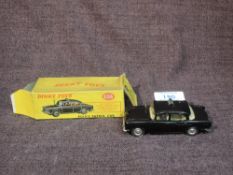 A Dinky diecast, 256 Police Patrol Car, in original box, missing one end flap