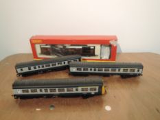 A Hornby 00 gauge DMU Power Car, Centre Carriage and Rear Carriage along with a Hornby 00 gauge
