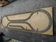 A 0 Gauge Three Rail Folding Layout on wooden folding trestle table, approx 270cm x 80cm