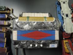 A Hero Accordian, made in Shanghai, China, 1960's