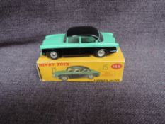 A Dinky diecast, 165 Humber Hawk, Green & Black in original correct spot box