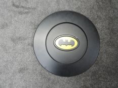 A wooden circular Bat Man Logo/Icon, diameter 52cm