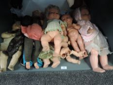 A shelf of mid 20th century and later Dolls including Palitoy and similar, composition, celluloid