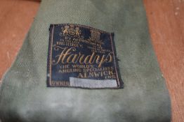 A 2pc split cane Hardy Palakona fishing rod in original sleeve