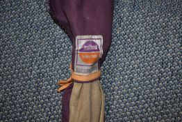 An Abu Colorit super zoom vintage 2 pc spinning rod, and a 2pc fiberglass rod marked Black Seal