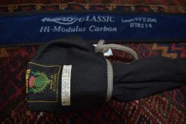 A Daiwa 3pc 11 1/4 ft #7-9 whisker fly rod and an Airflo classic 9 1/2 fly rod withsoft sleeves