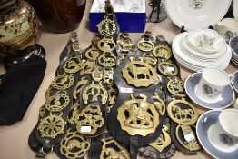 A selection of vintage brass and leather Martingales