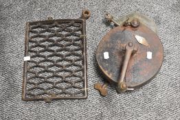A antique stone grinder with label' The Carborundum Co, Niagra Falls.