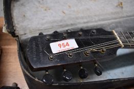 A vintage Mandolin marked , W ALLISOSTRO ZITHER MANDOLINE