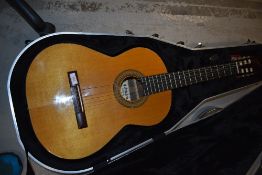 An Admira 1000E classical, with pickup fitted (passive) , in hard shell case
