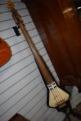 An Arco Resonet upright electric stick bass