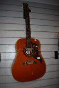 A vintage Eko jumbo acoustic guitar with pickup