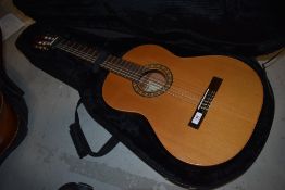 A modern Spanish classical guitar, labelled Almansa, in hard AAA case
