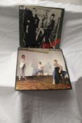 A copy of the debut album by the Clash and also in this lot an album by the Jam - Mod / Punk