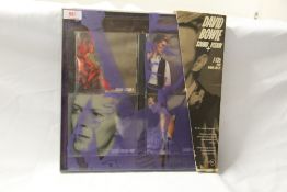 A David Bowie - 3 compact disc box set ' Sound and Vision ' with some wear to outer packaging -