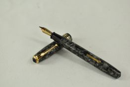 A Conway Stewart 58 lever fill fountain pen in silver grey hatch with single broad band and two