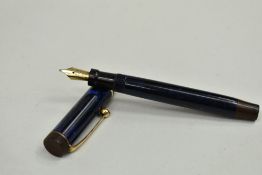 A Parker Duofold Lucky Curve Lady button fill fountain pen blue black with three bands to the cap