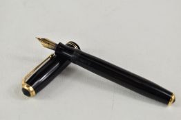 A Parker Vacumatic pump fill fountain pen in black with two narrow band to the cap having Parker