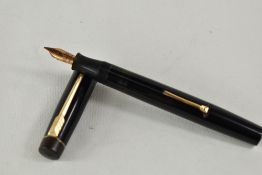 A Croxley lever fill fountain pen in black with single narrow band to cap having Dickenson nib.