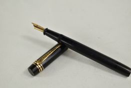 A De la Rue Onoto the pen plunger fill fountain pen in black knerl with one broad and two narrow