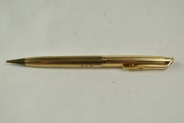 A Waterman rolled gold propelling pencil (engraved)