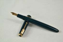 A Parker Junior Duofold aeromatic fill fountain pen in green, having decorative band to the cap