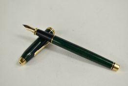 A Cross Townsend converter fountain pen in jade green marble having Cross nib. Approx 14.9cm very