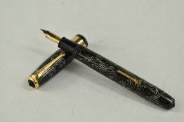 A Conway Stewart 60 lever fill fountain pen in silver grey hatch with single broad band to the cap