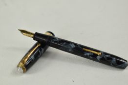 A Conway Stewart 27 lever fill fountain pen in blue black marble with single broad band to the cap
