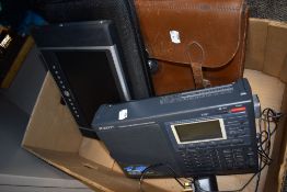 A Roberts digital radio set, a Next Base digital DVD player and a leather satchel
