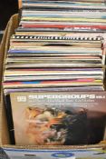 A selection of one hundred mixed vinyl albums and LP's