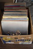 A selection of one hundred mixed vinyl albums and LP's