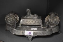 An Art Deco era James Deakin cast metal desk stand with an Egyptian theme
