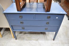 A painted bedroom chest of two over three drawers on square tapered legs