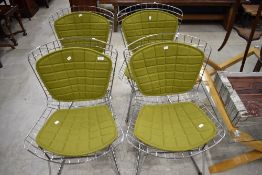 A set of four chrome designer chairs, Harry Bertoia style , with seat and back pads