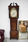 A 19th Century mahogany long cased clock having eight day movement , painted dial named for T