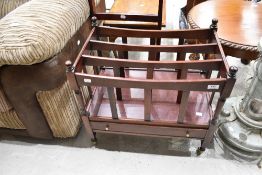 A reproduction Regency Canterbury style magazine rack