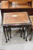 A reproduction nest of three tables