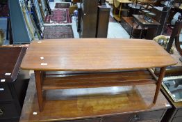 A vintage teak coffee tables having slatted undertier