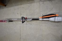 An electric hedge/tree trimmer