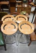 A set of four designer bar stools stamped Lyra