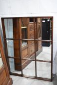 A vintage paned wall mirror, Stag or similar, approx. 110 x 93cm