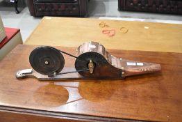 A set of traditional cranked treen and copper bellows