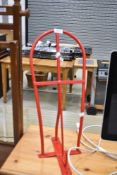 A metal saddle rack