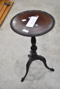 An early 20th Century mahogany occasional wine table